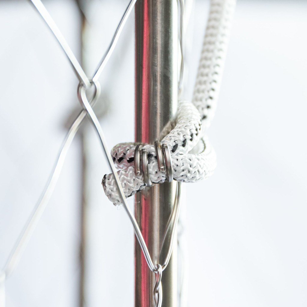 Close-up of bungee crimping for crab trap lid