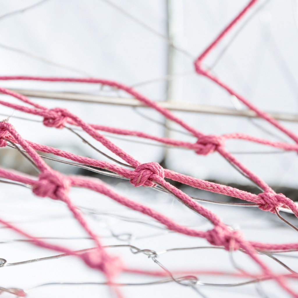 Tunnel and weaving photo with pink twine