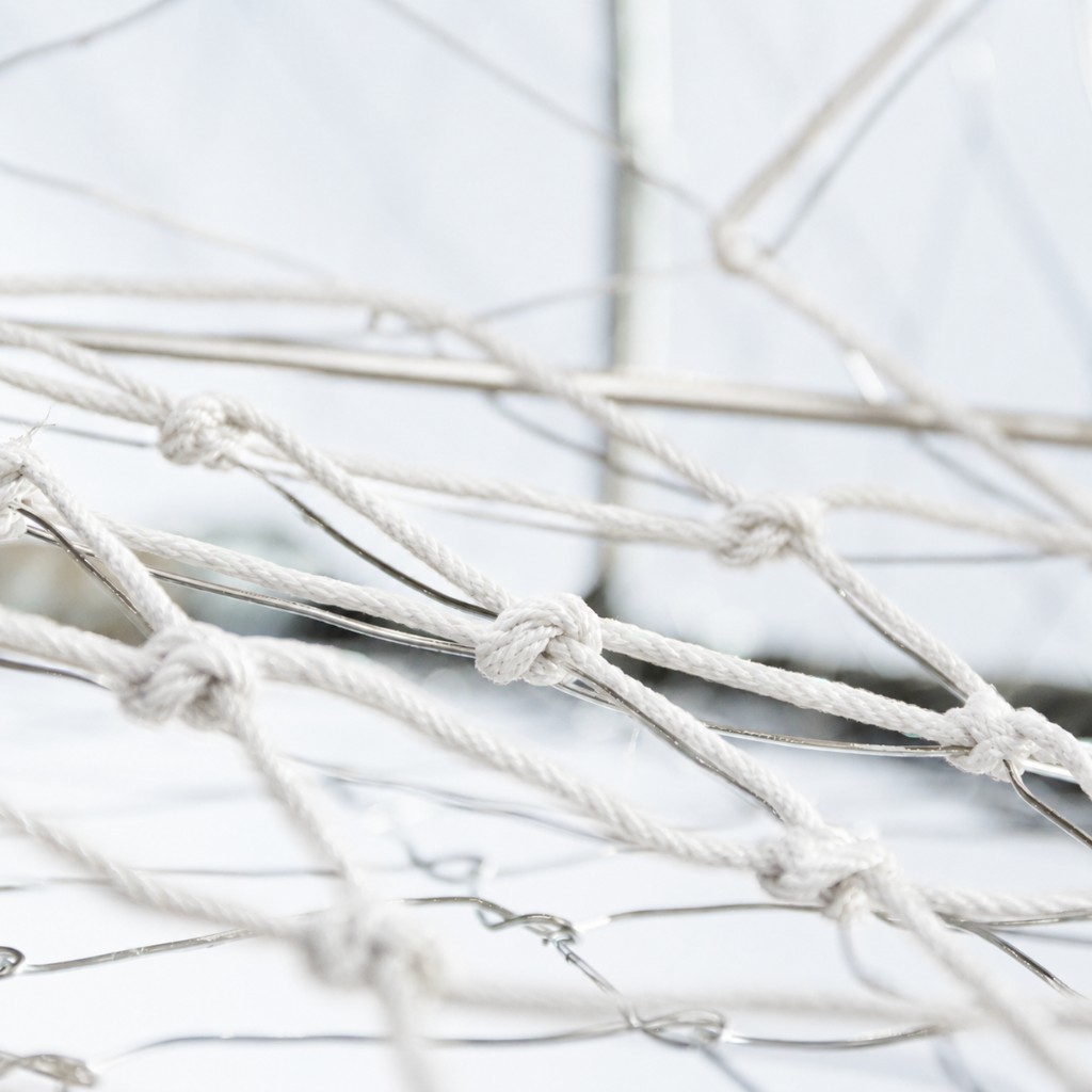 Tunnel and weaving photo with white twine